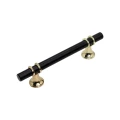 PUXADOR ENLACE 96MM - PRETO COM DOURADO